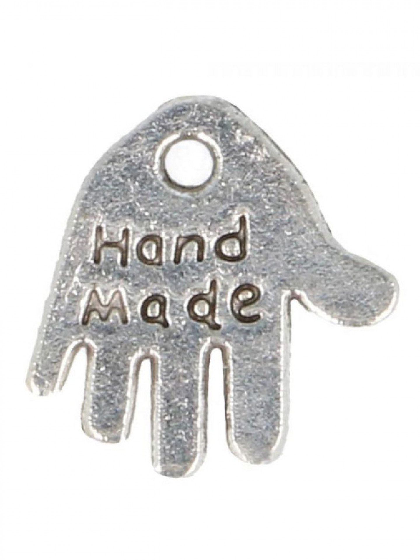 Metallinen "Hand Made" -merkki